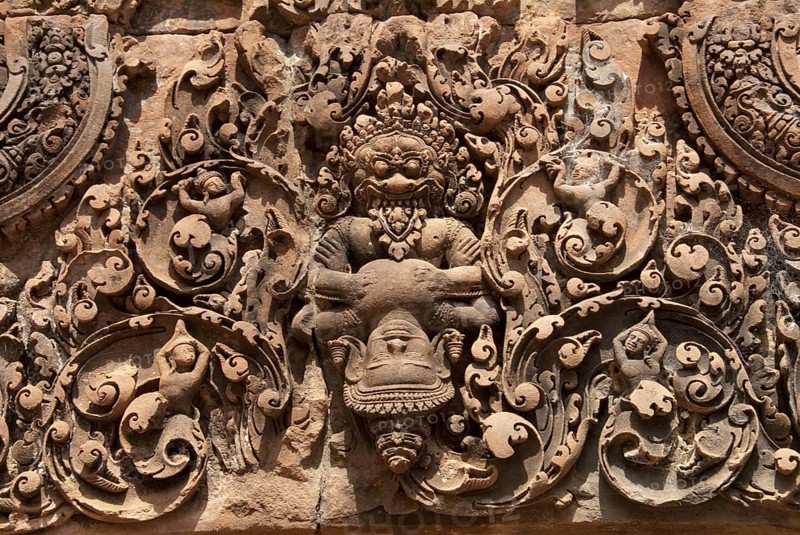 Bas-relief in Khmer Hindu temple depicting Vishnu ripping the breast of King Hiranyakasipu