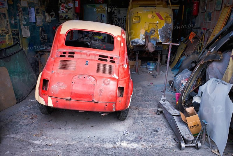 Historic old Fiat 500 in garage