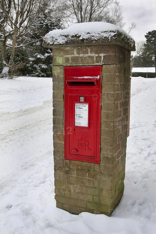 Royal Mail letterbox in the snow
