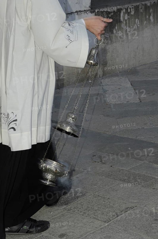 Incense waving altar boy