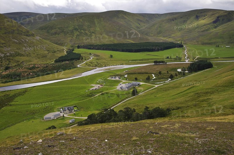 View of houses and river in valley