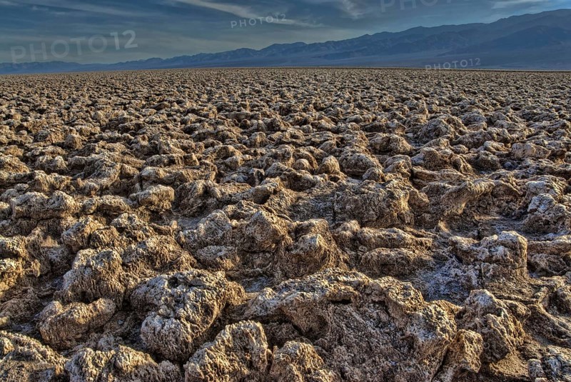 Crust of halite salt crystal formations on saltpan