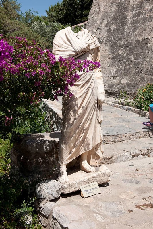 Headless marble statue