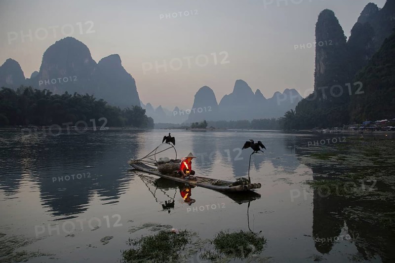 Traditional fisherman with trained cormorants