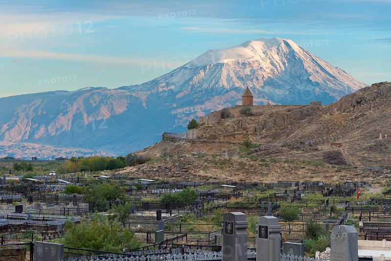 Cemetery of the village Khor Virap with the monastery and Mount Ararat behind