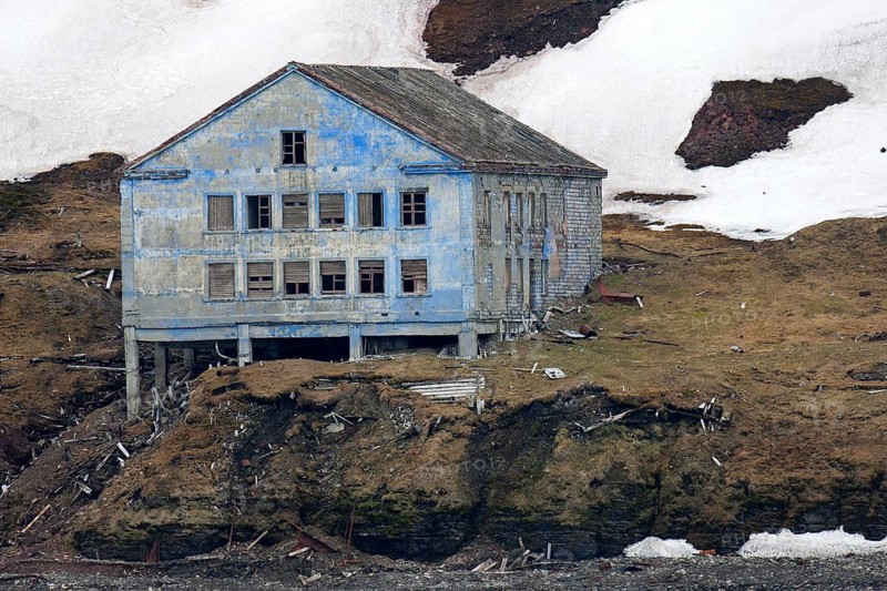 Derelict building of the abandoned Russian mining settlement in Svalbard