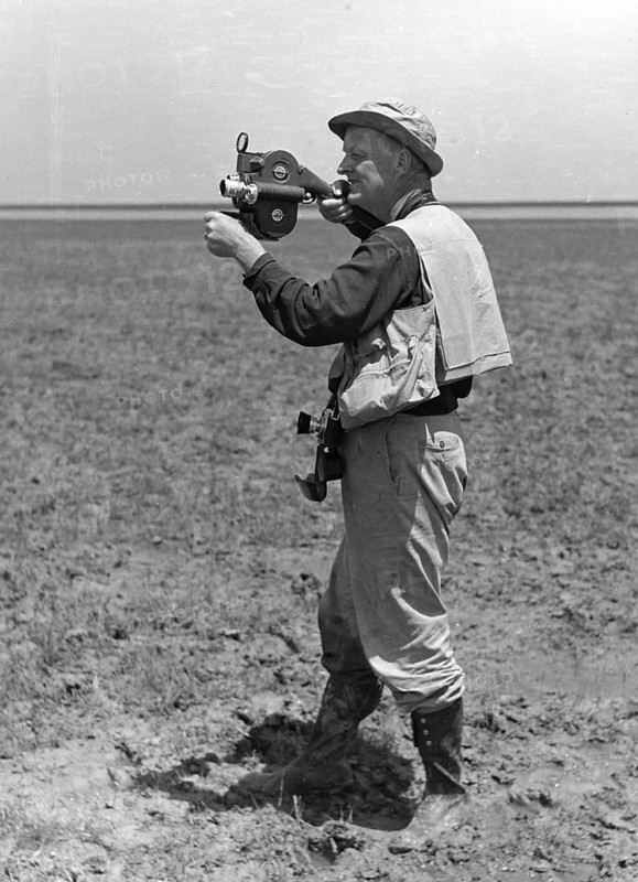 Dr Roger Tory Peterson with a film camera Coto Donana 1956