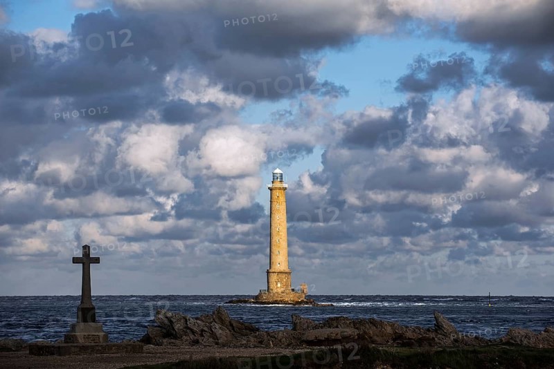 Lighthouse at Cap de La Hague and monument in honour of the French submarine crew Vendemiaire