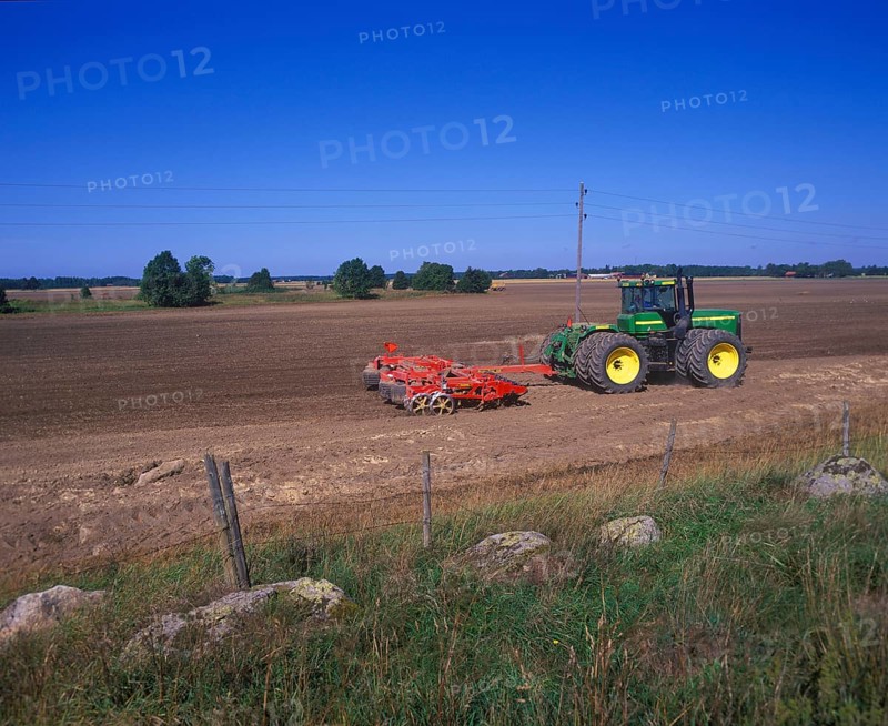 Large tractor with roller