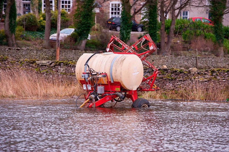 Lely field sprayer in flood water