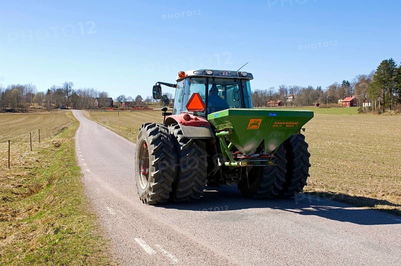 Tractor with Amazone ZA-F fertiliser spreader