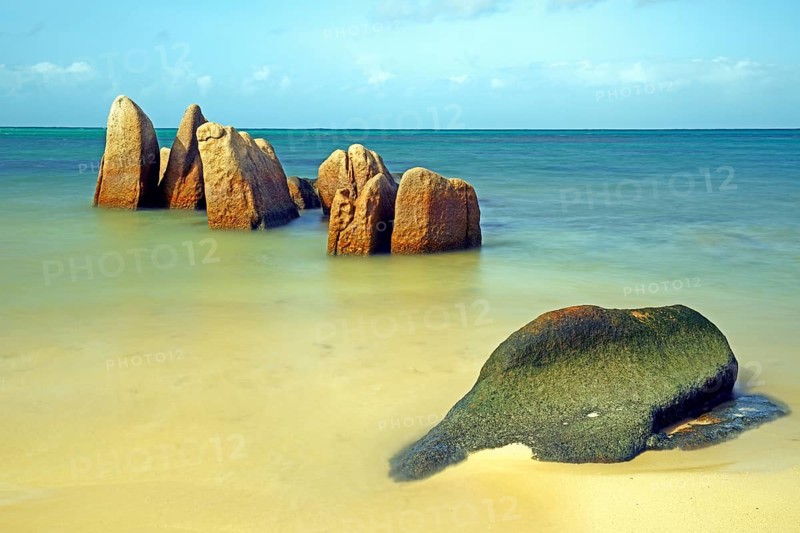 Granite rocks in the sea in the early morning