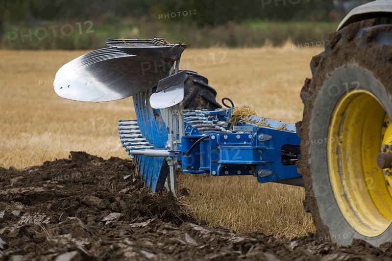 Close-up of an eight-furrow reversible plough