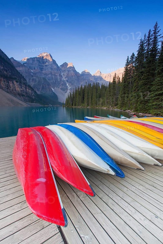 Colourful canoes at Moraine Lake in the Valley of the Ten Peaks