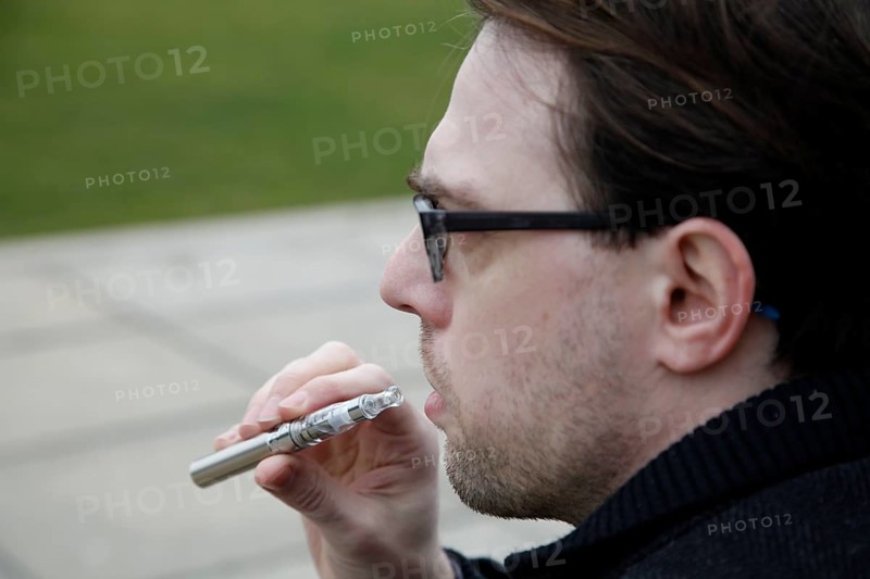 Man with e-cigarette