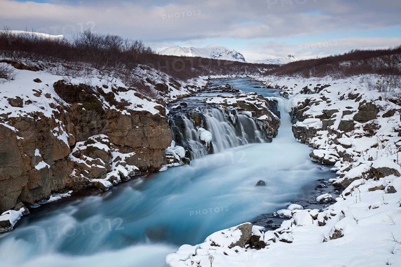 Hlauptungufoss waterfall on the Bruara River in winter