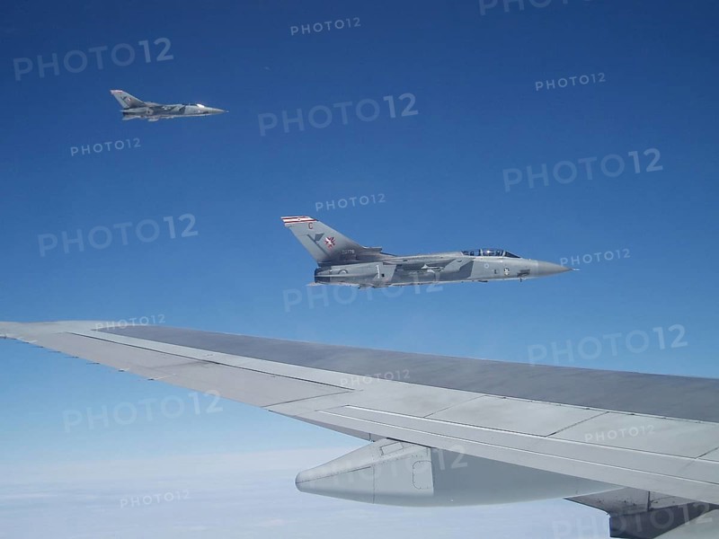 RAF Tornado fighter jets fly close to Boeing 747s