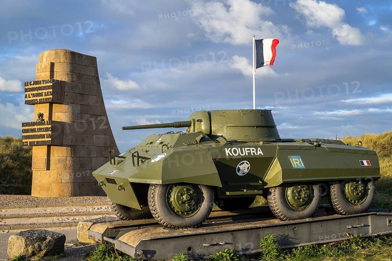 The Leclerc Monument and the M8 Greyhound light armoured car of the Forces francaises libres