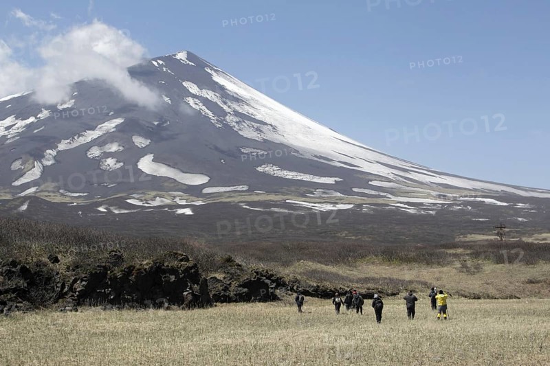 View of tourists and volcano