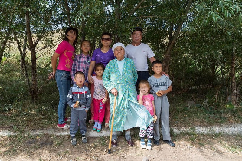 Kazakh family with children and an elderly woman
