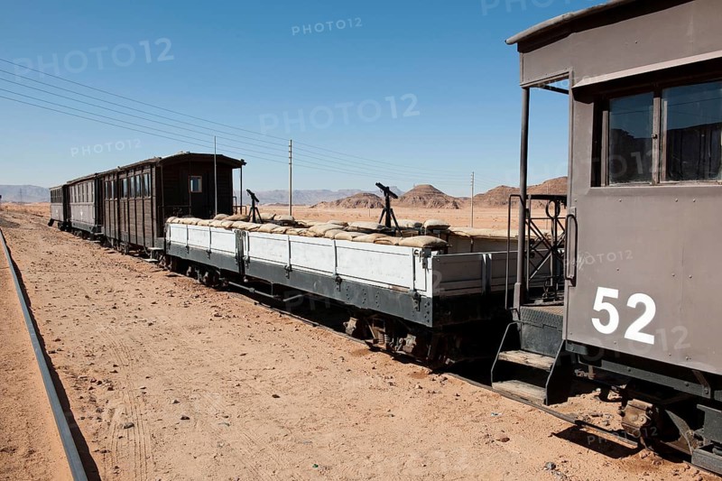 Railway wagon with stand for machine gun
