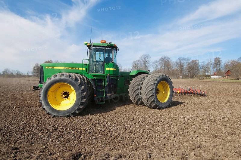 John Deere 9400 Tractor with Harrows