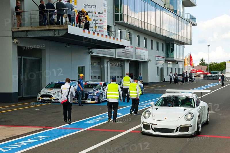 Porsche GT3 race taxi in pit lane