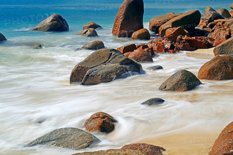 Beach and granite rocks at Anse Possession