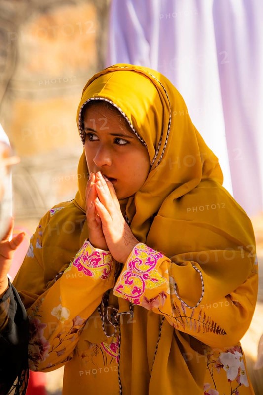 Woman during the Friday Goat Market in Nizwa