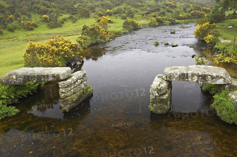 Ruined rattle bridge over the river