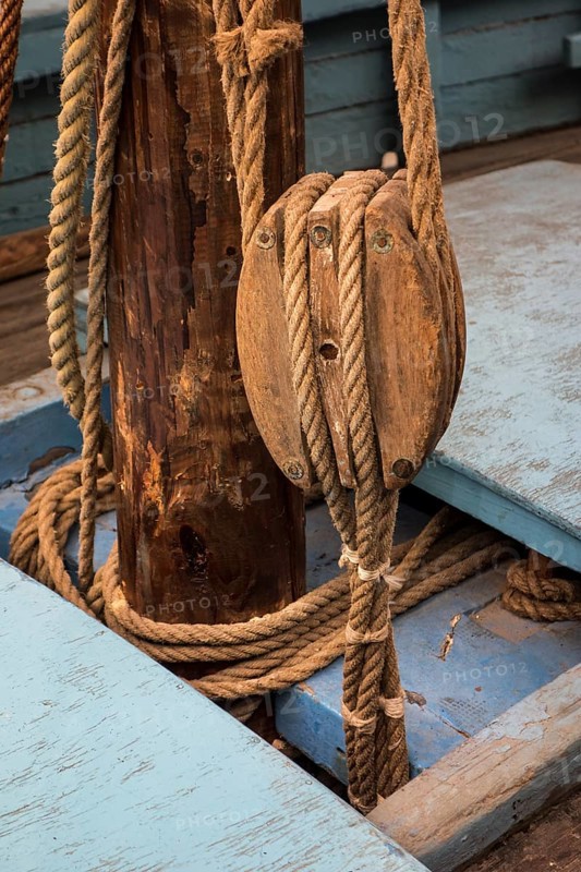 Rope in wooden pulley