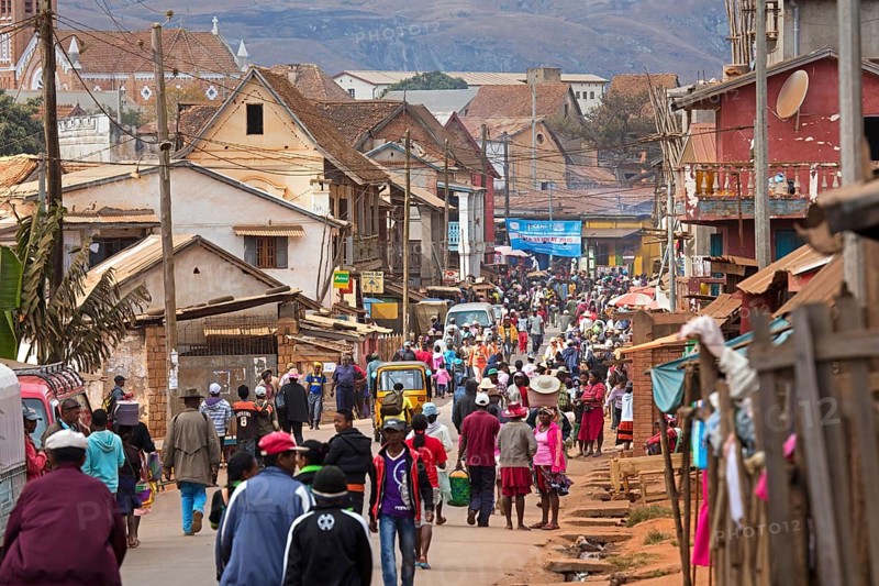 Malagasy locals shopping in the colonial main street of Ambalavao town