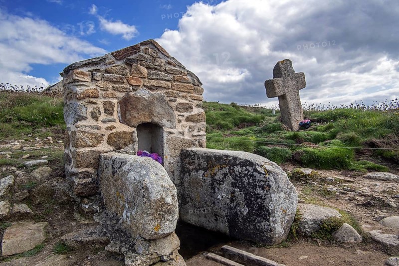 Saint well and stone cross at Saint Samson Chapel