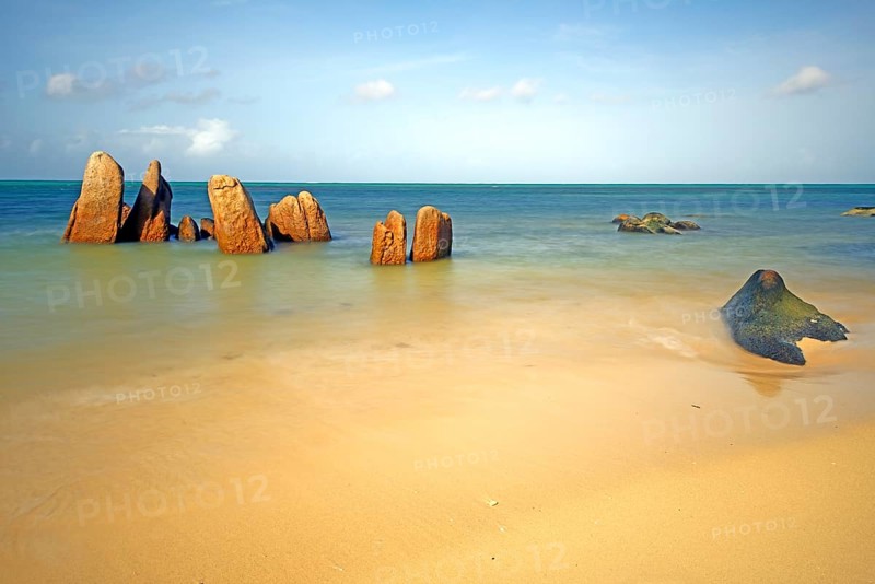 Granite rocks in the sea in the early morning