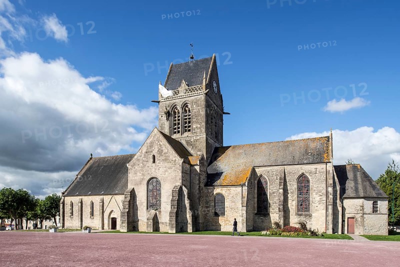 Church of Sainte-Mere-Eglise with parachute memorial in honour of paratrooper John Steele