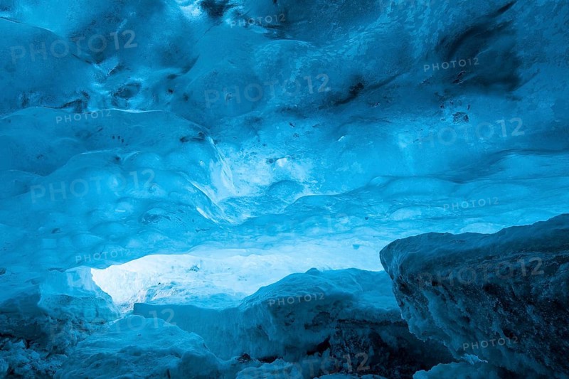 Blue ice mixed with volcanic ash in ice cave inside Breidamerkurjokull