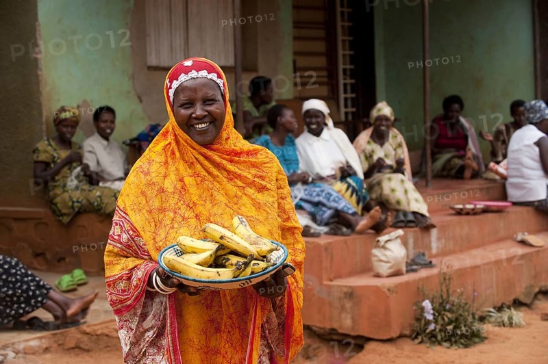 Smiling Muslim lady with light headscarf