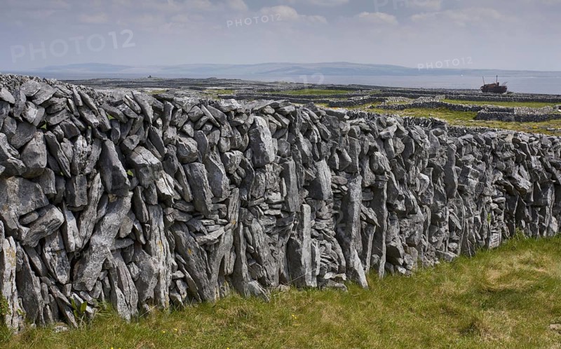 Old limestone drystone wall with small fields