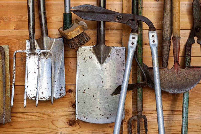 Garden tools in garden arbour