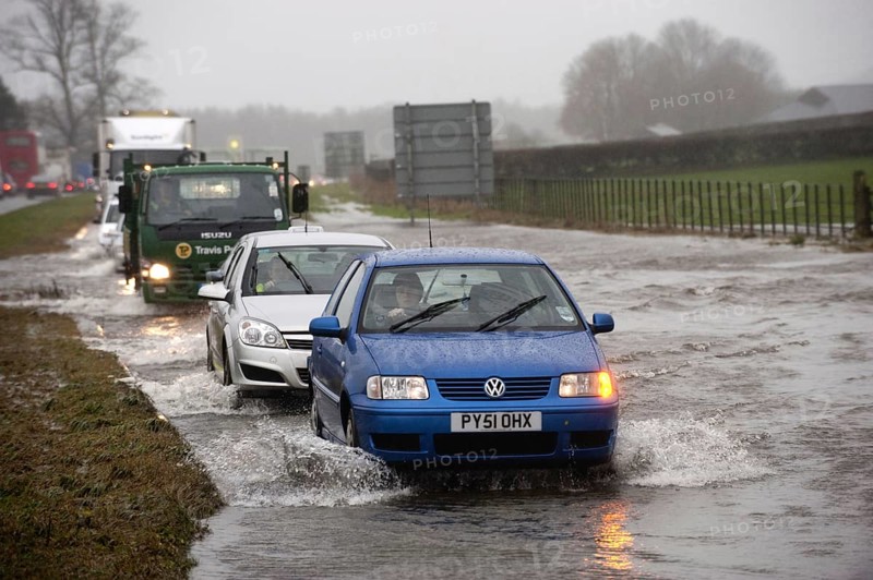 Flooded road with traffic