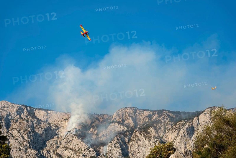 Firefighting aircraft in forest fire