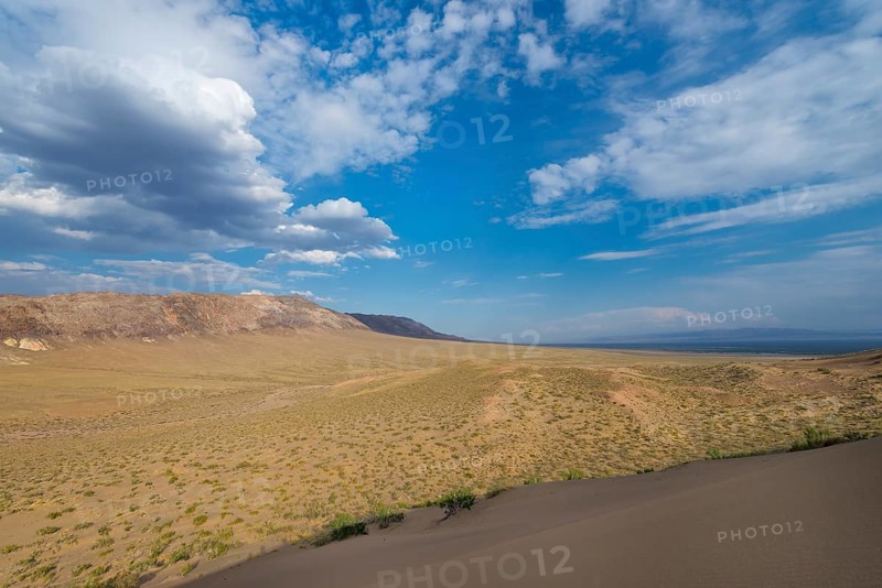 Aktau Mountains seen from the Singing Dunes