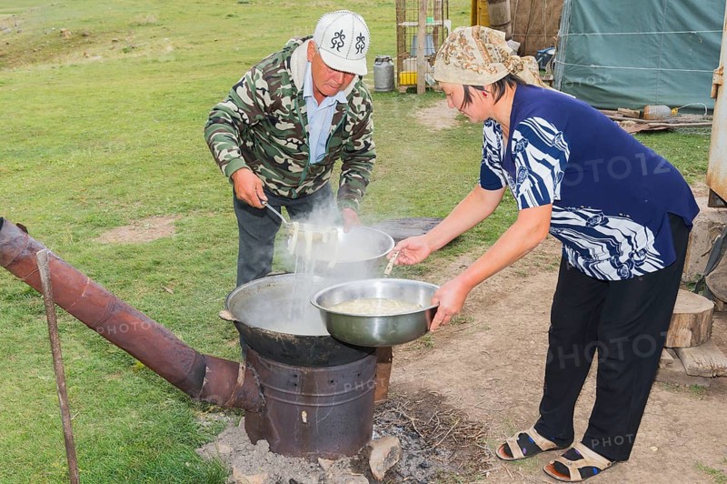 Kazakh nomads preparing noodles