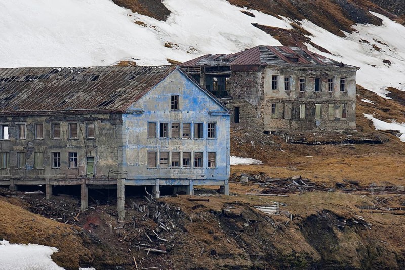 Dilapidated buildings of the abandoned Russian mining settlement in Svalbard