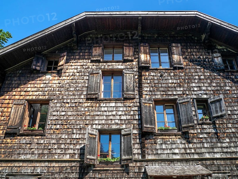 House with wooden shingles at the Wolfgangsee in the Salzkammergut