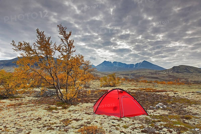 Red dome tent in Doraldalen valley