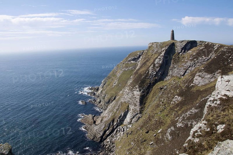 View of coastal cliffs and commemorative monument