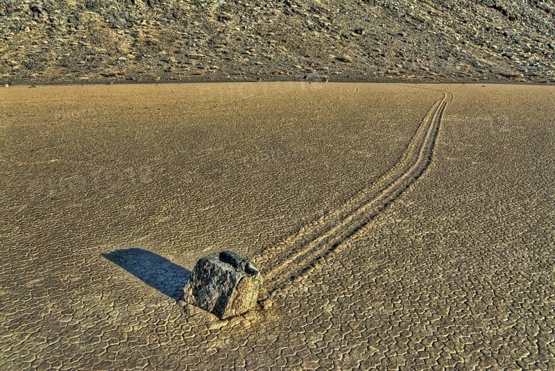 'Sailing stones' geological phenomenon of rocks moving along tracks on valley floor