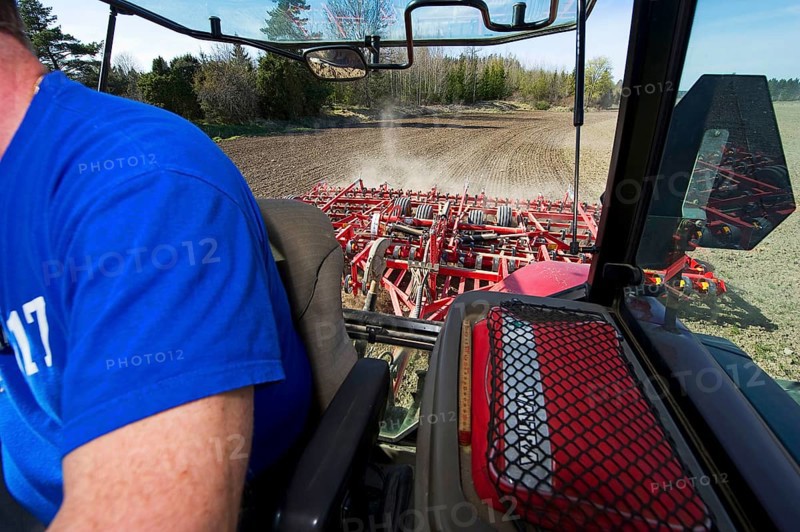 Case MXM 155 tractor cab interior with Vaderstad NZ-Aggressive-700 harrows