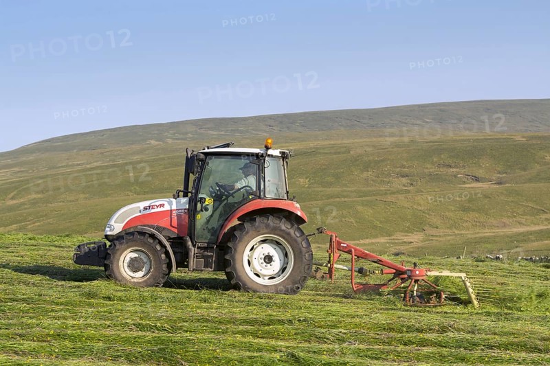 Steyr tractor with tedder